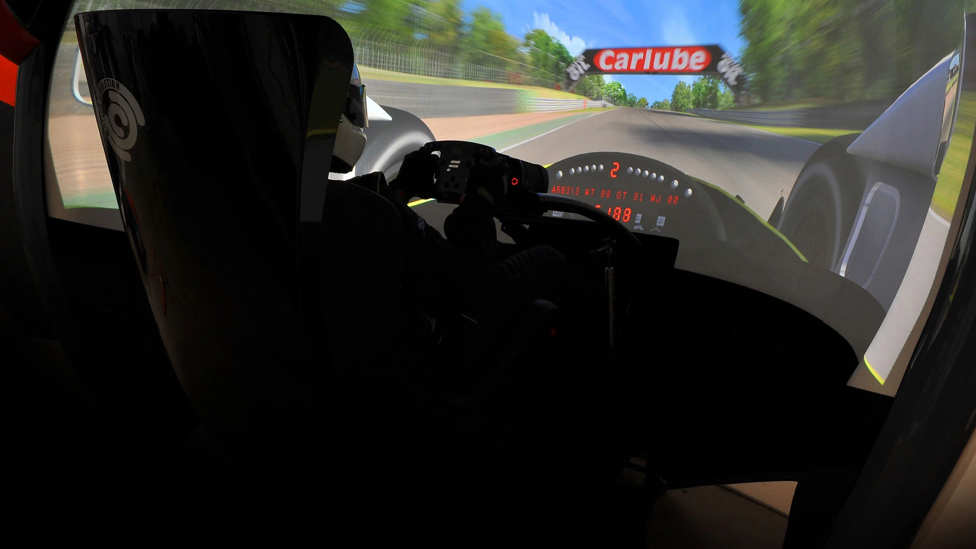 One of many different race car setups inside a Motion Simulation pod