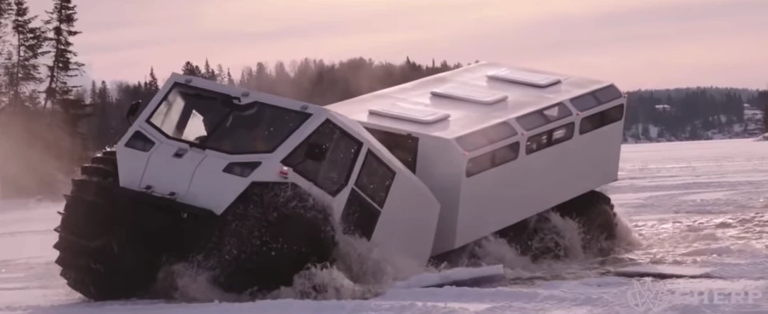 The Ark makes its way over ice and through water