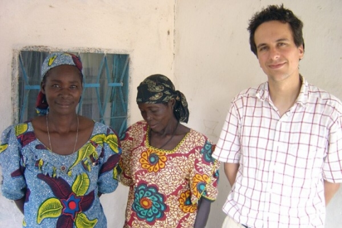 Researcher Thomas Fritz with two of the Mafa women who participated in his music study to demonstrate music conveys emotion across cultures