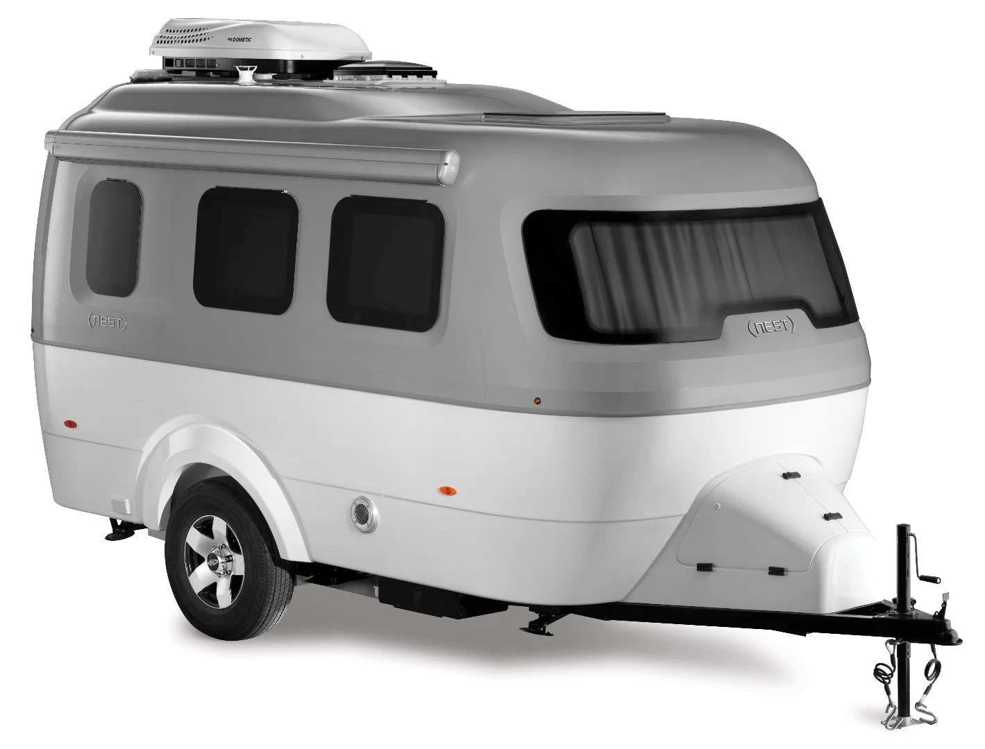 The main exterior distinction from original Nest to Airstream Nest is the new array of exterior windows - six side windows, a large front windshield and a tall rear door window join a skylight in bringing plenty of light in