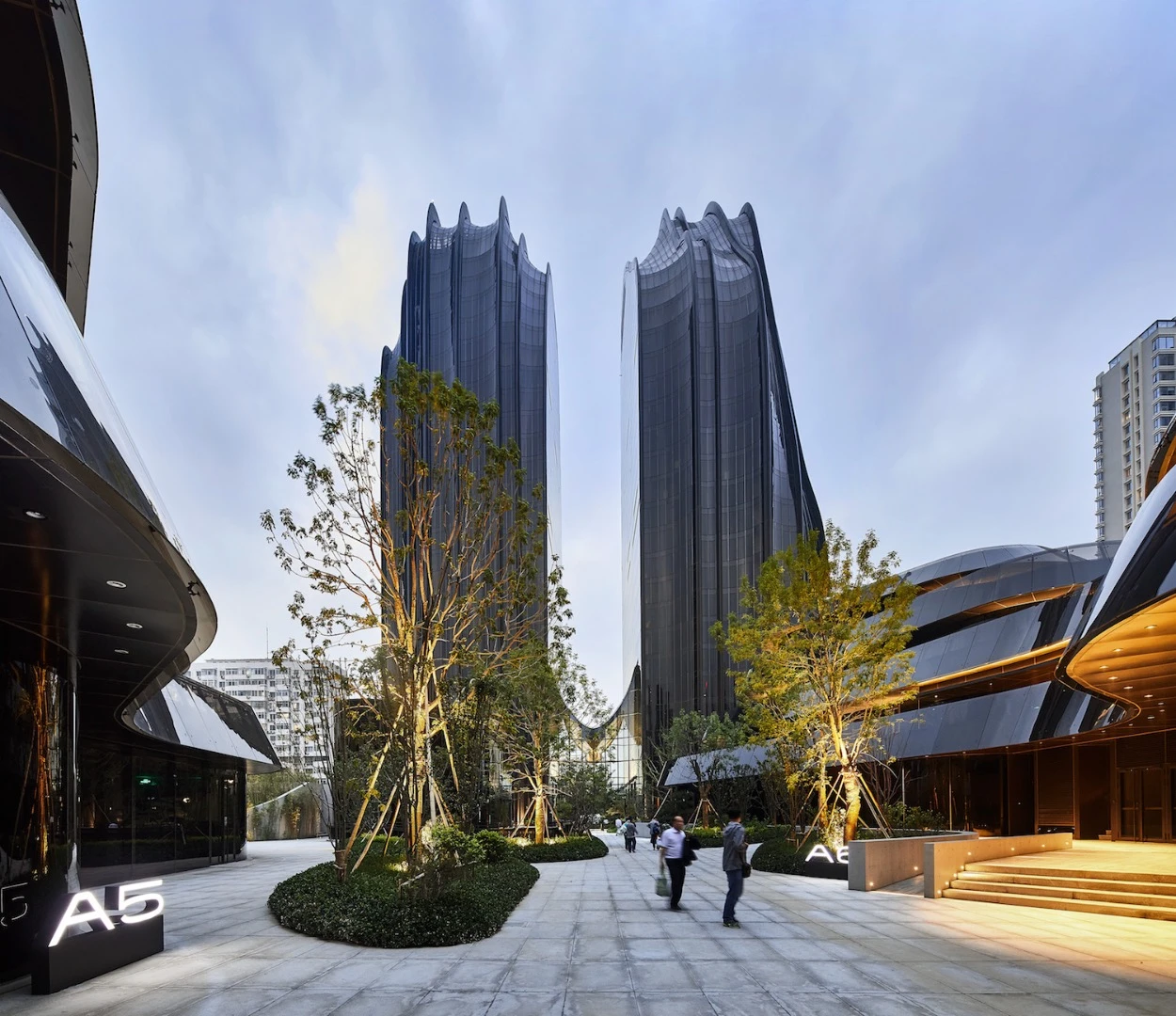 The Chaoyang Park Plaza's towers are joined by a glass atrium