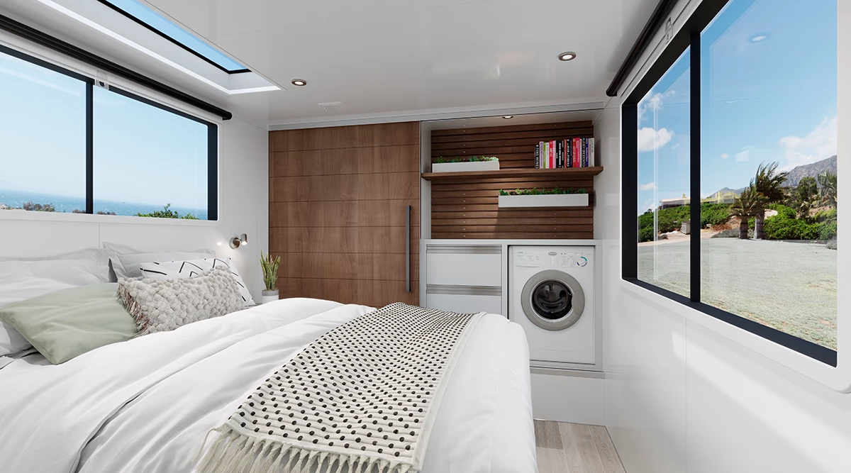 Master bedroom also features a washing machine and storage space