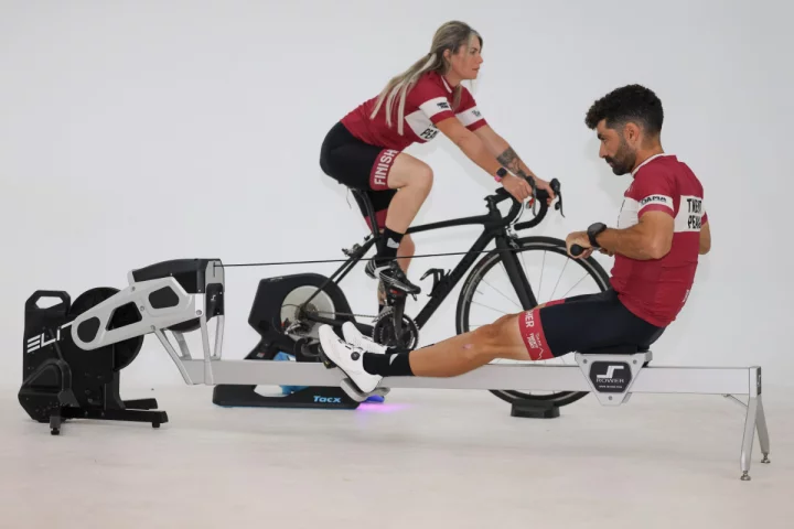 The S-Rower (front) uses your existing bike trainer as its resistance mechanism, saving money and space