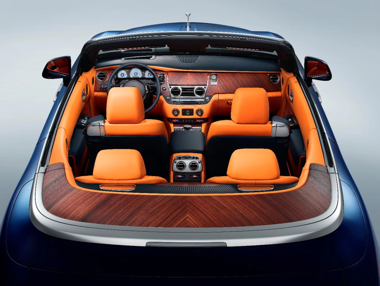 The wooden paneling and open top make the Dawn look almost boat-like