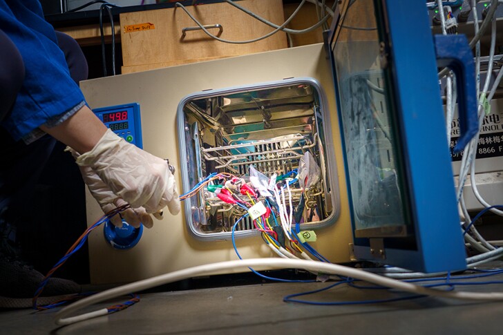 Battery cells are tested in an oven