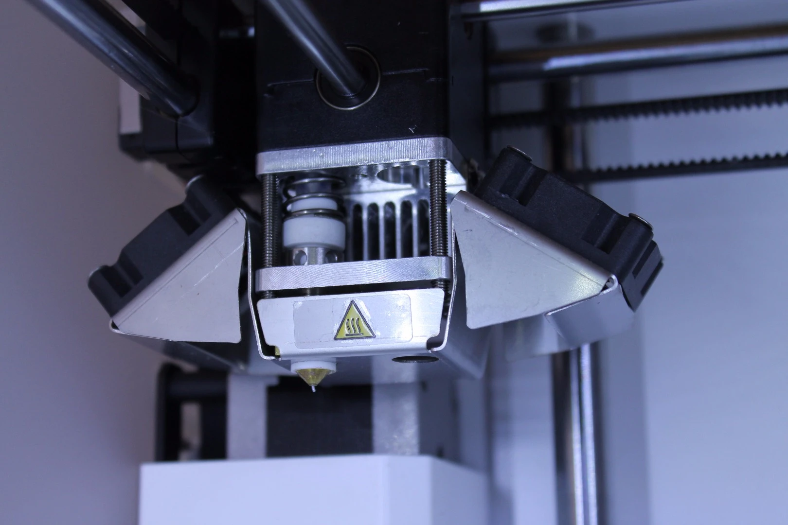 The device prints with extruded PLA or ABS plastic