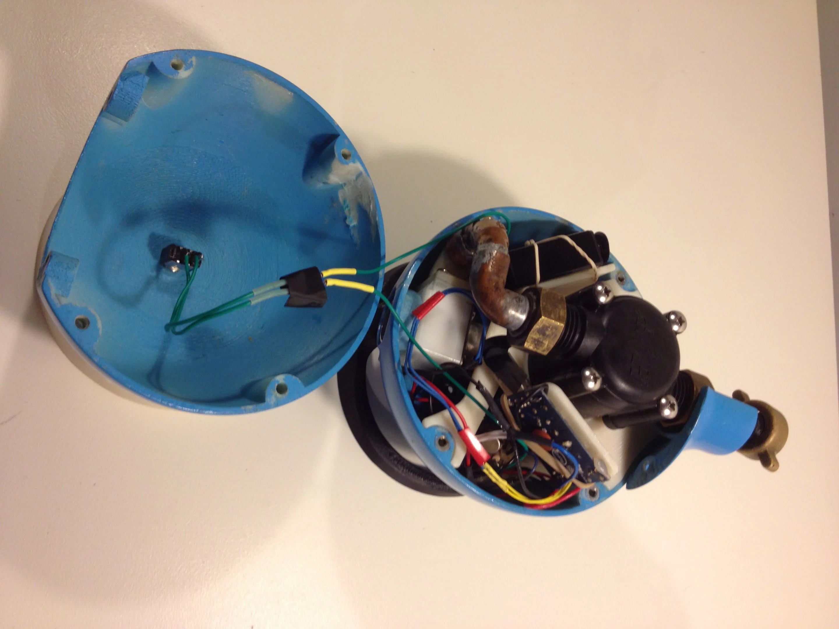 TipTapTop opened up to reveal the hydroelectric generator, speakers and other components