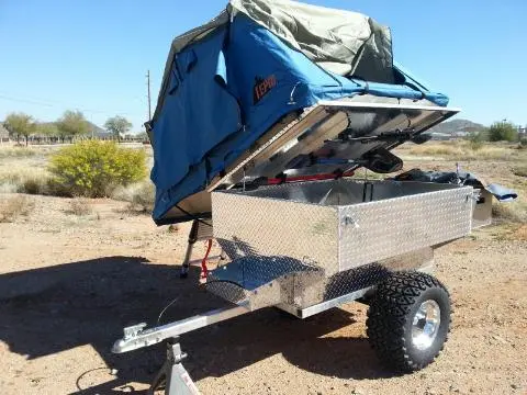 The MOAB Crawler has a two-person rooftop tent