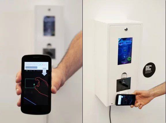 The machine delivers random digital content - such as apps, movie trailers, songs or e-books - to the smartphone placed near the release shoot