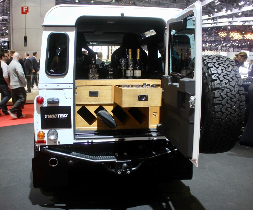 UK's Twisted Automotive shows one of its Land Rover Defenders amply prepared for postgame happy hours