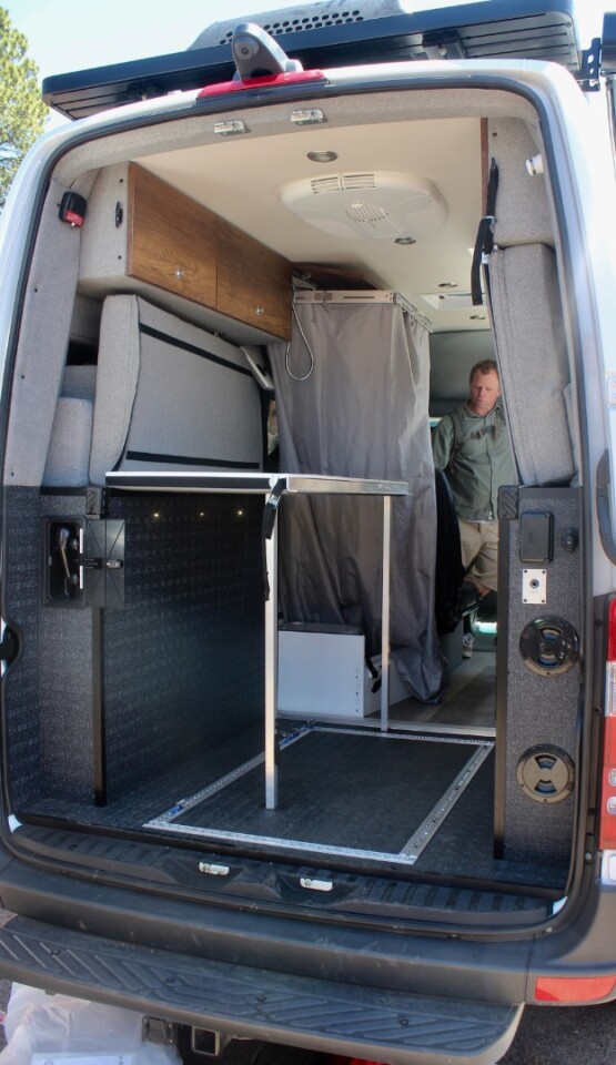 The bed platform can drop down and work as an extra table