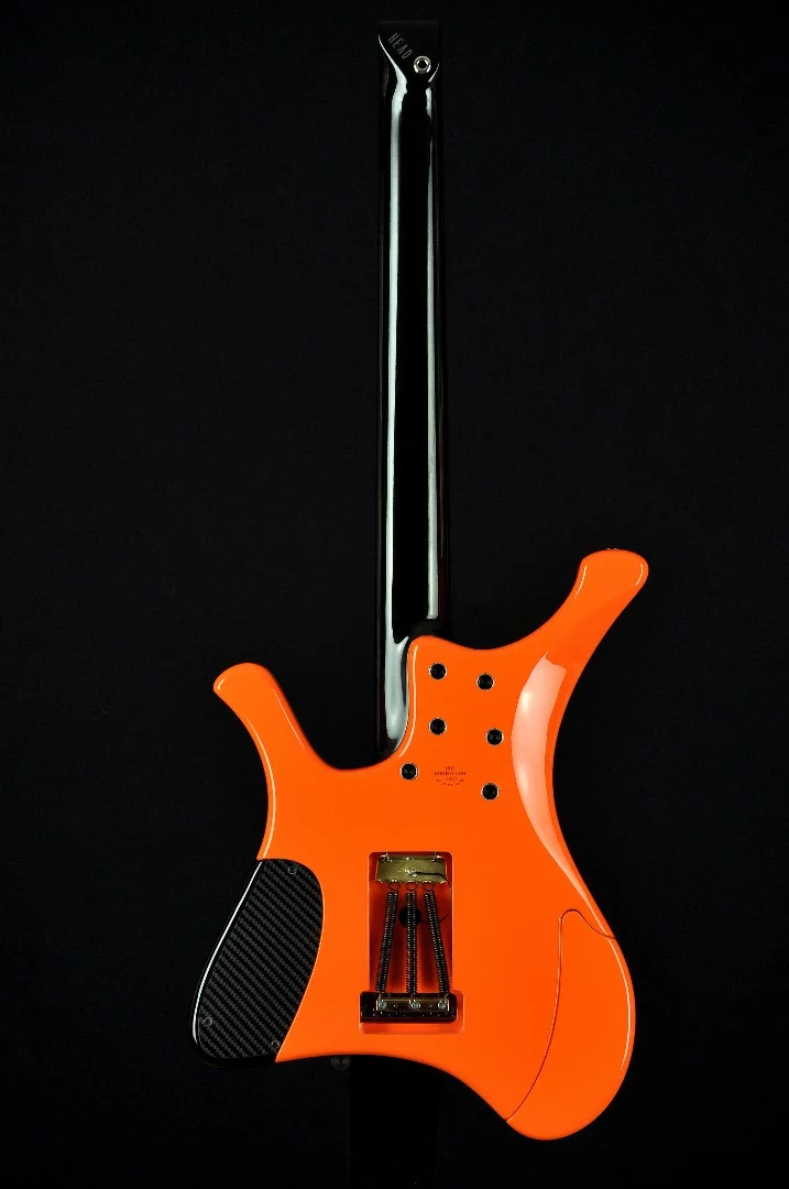 The Ego Thunder features a contoured alder body and headless maple neck
