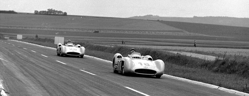 Fangio and Kling during the 1954 French Grand Prix