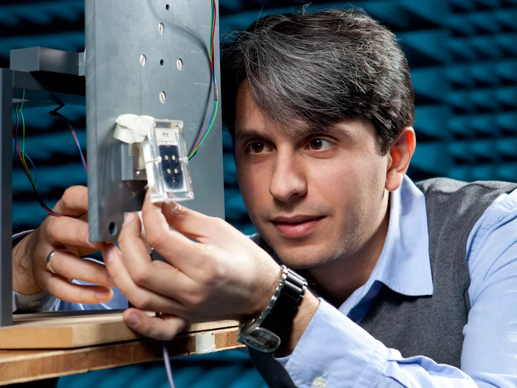 Onur Hamza Karabey and his prototype liquid crystal antenna
