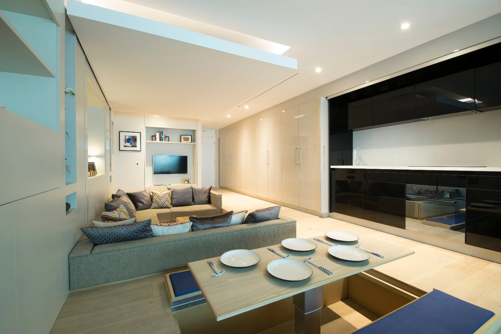 Sections of floor in Yo! Home apartments fold open and backwards to create benches