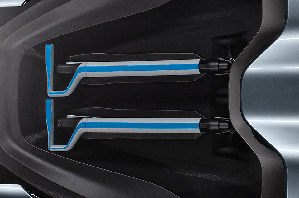 BMW's i8 Spyder with two matching BMW three-wheeled electric kick scooters in the rear
