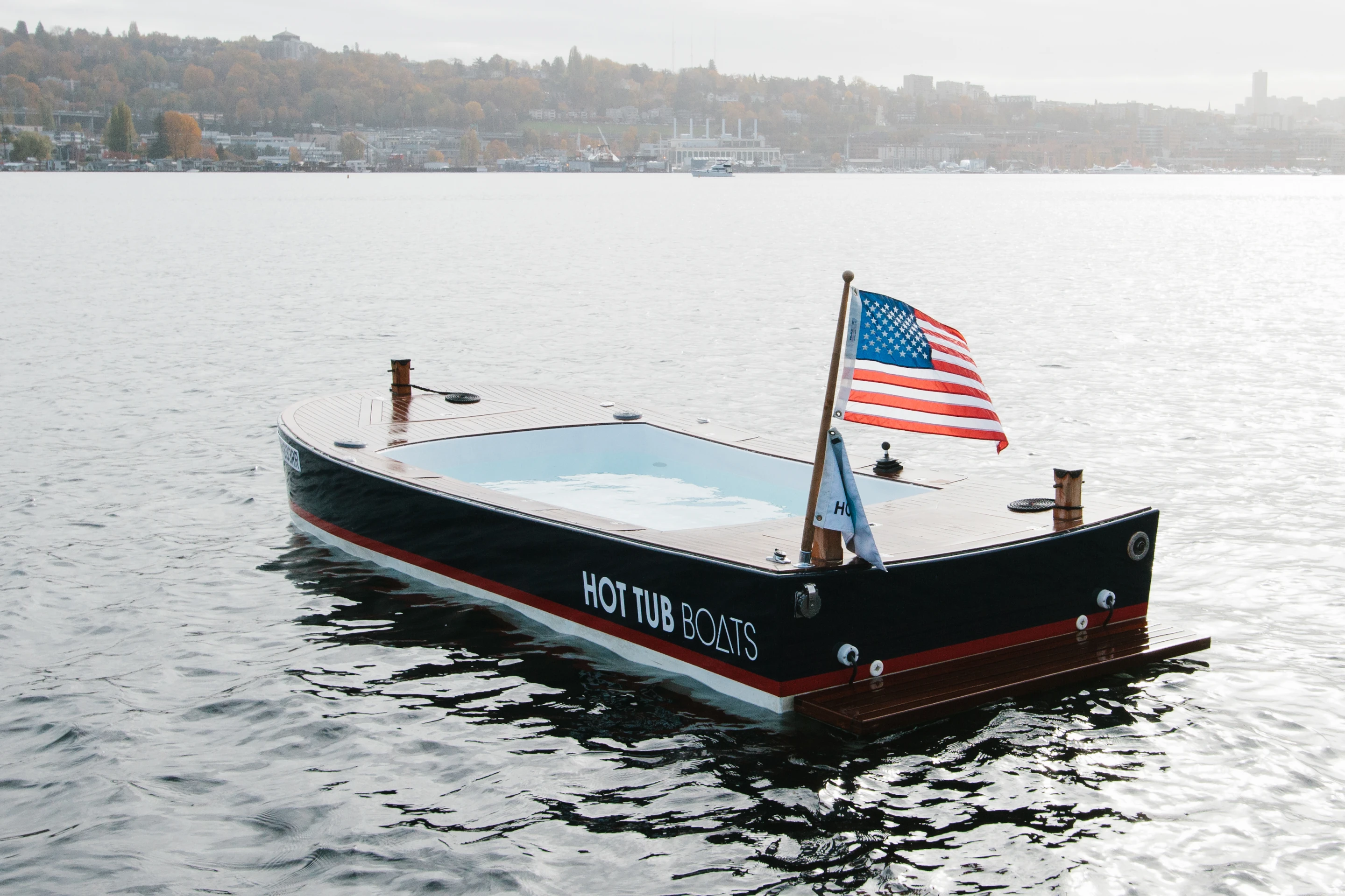 The Hot Tub Boat allows its passengers to soak while they cruise