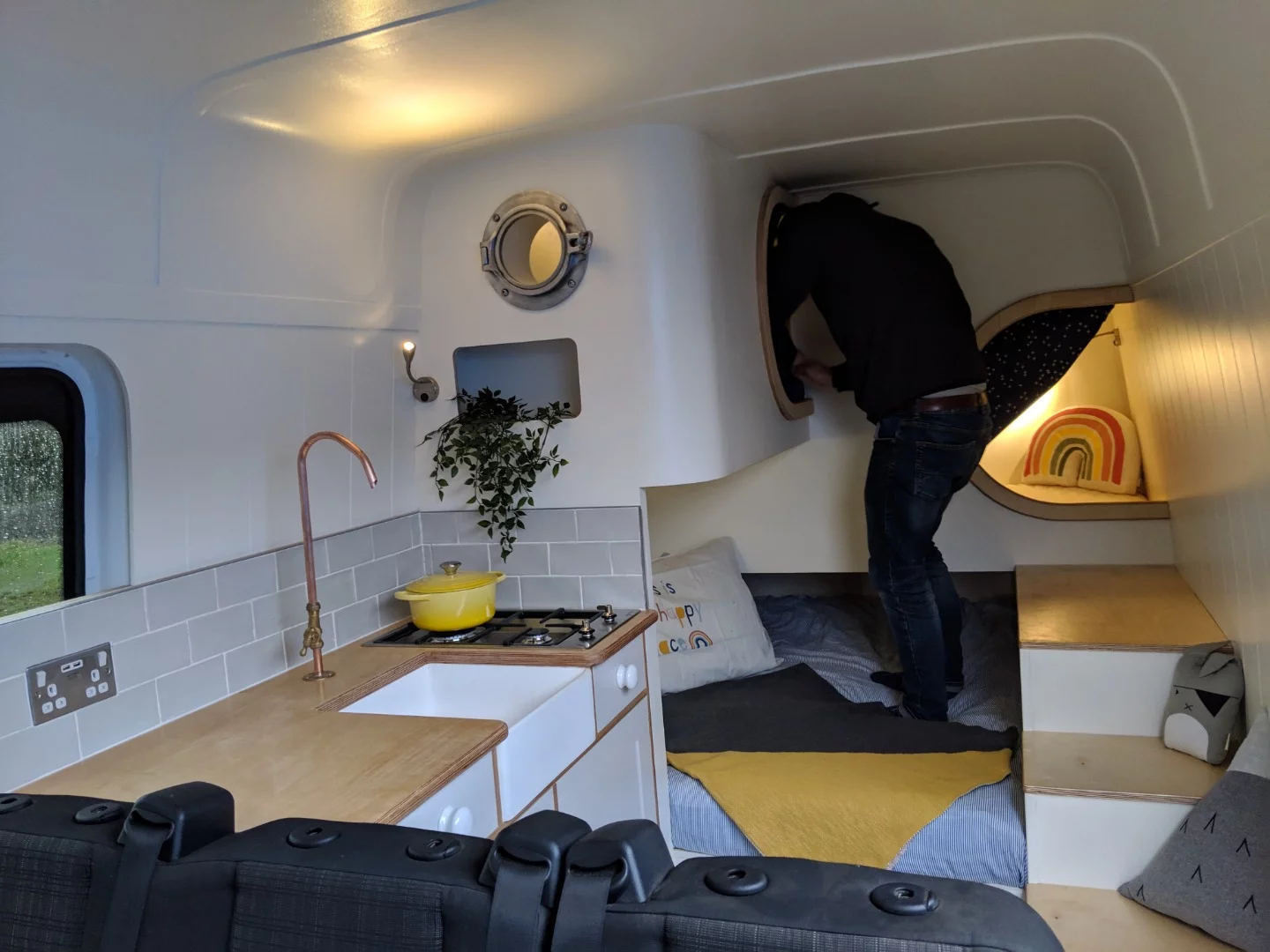 Access to the top bunk is via the main double bed