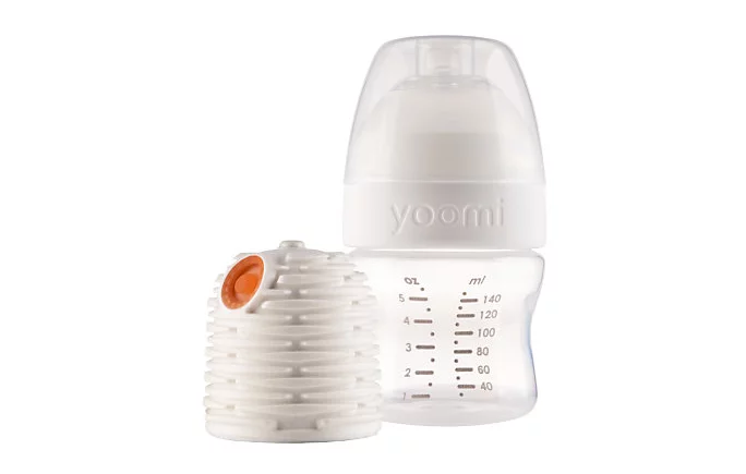 The Yoomi bottle heats milk in about a minute