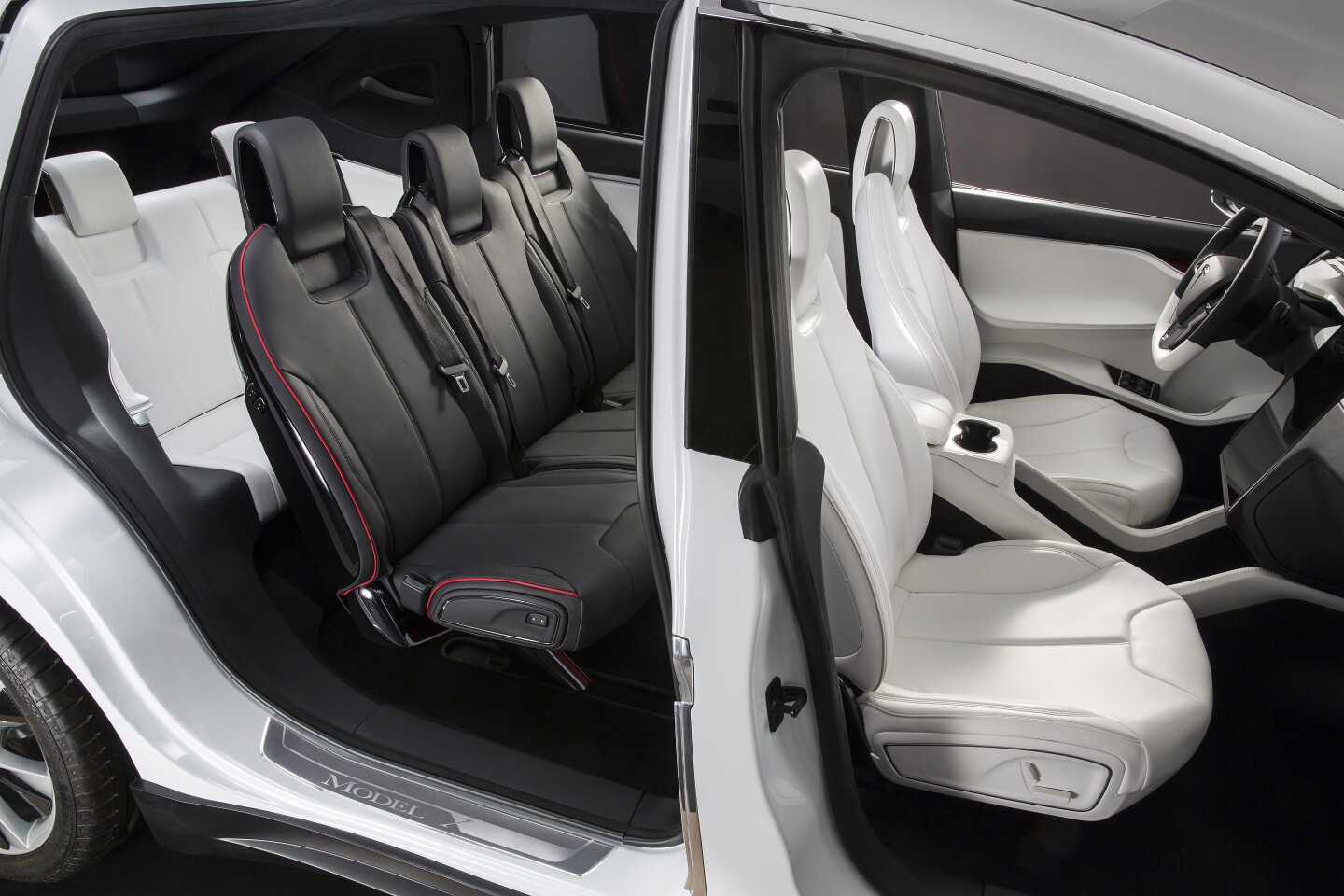 The car's falcon wing doors will let second and third row passengers easily access their seats in tight parking spaces