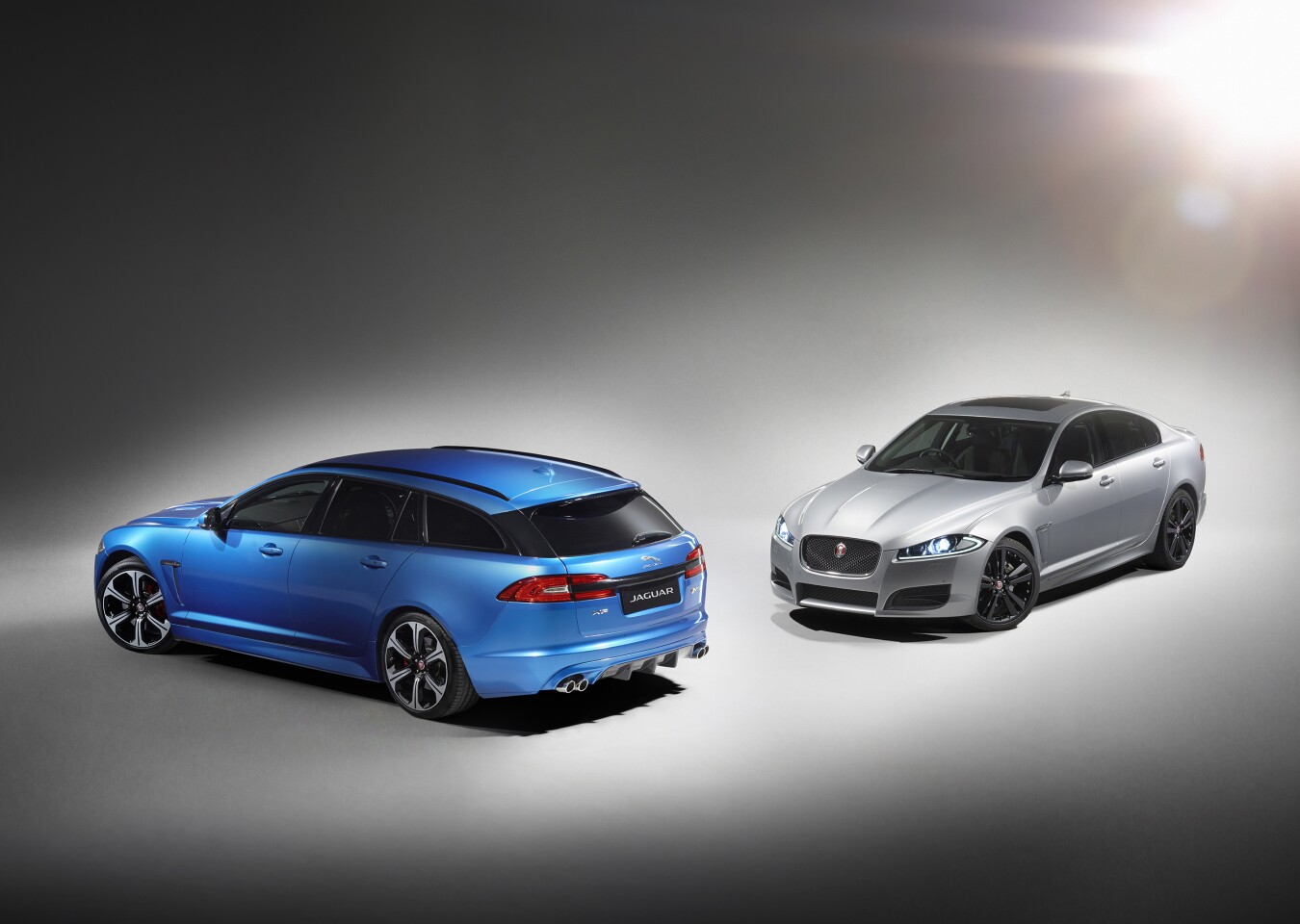 The the XFR-S Sportbrake at left, with the car from which it was derived, the XFR-S Saloon at right.