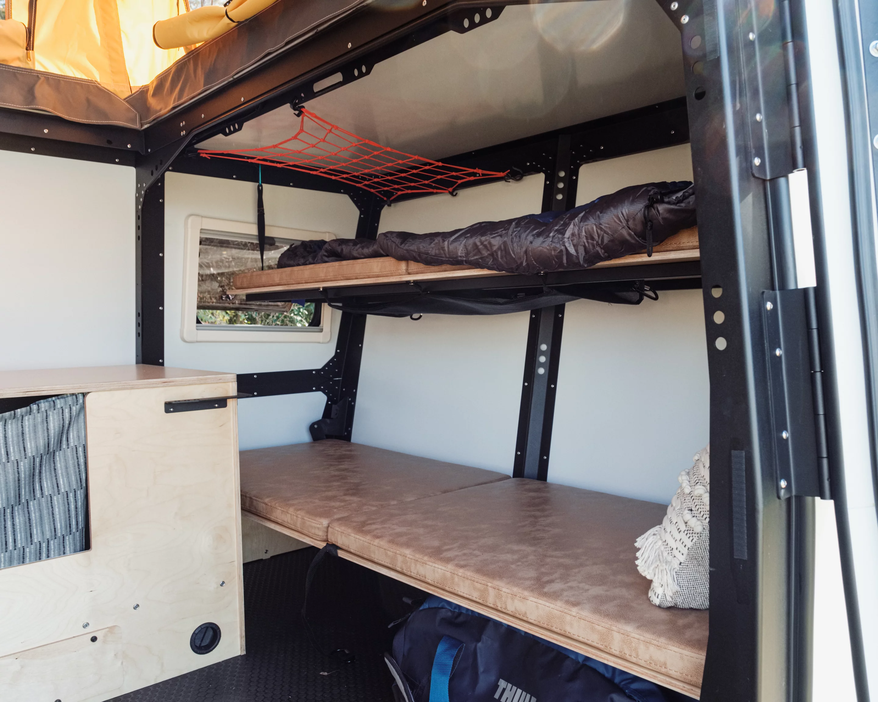 Taxa has widened the front bunks, which double as a front seating bench