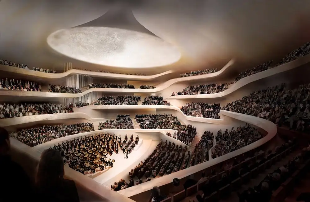 The Elbphilharmonie's Grand Hall has an orchestra pit in the middle and tiered seating for up to 2,100