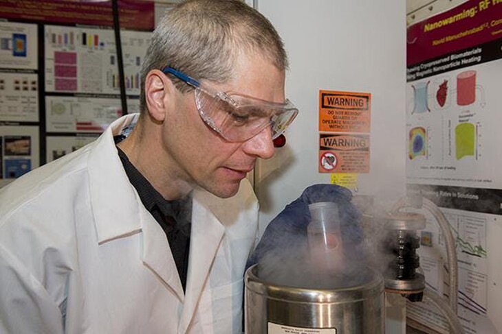 Professor Bischof removing a cryopreserved sample