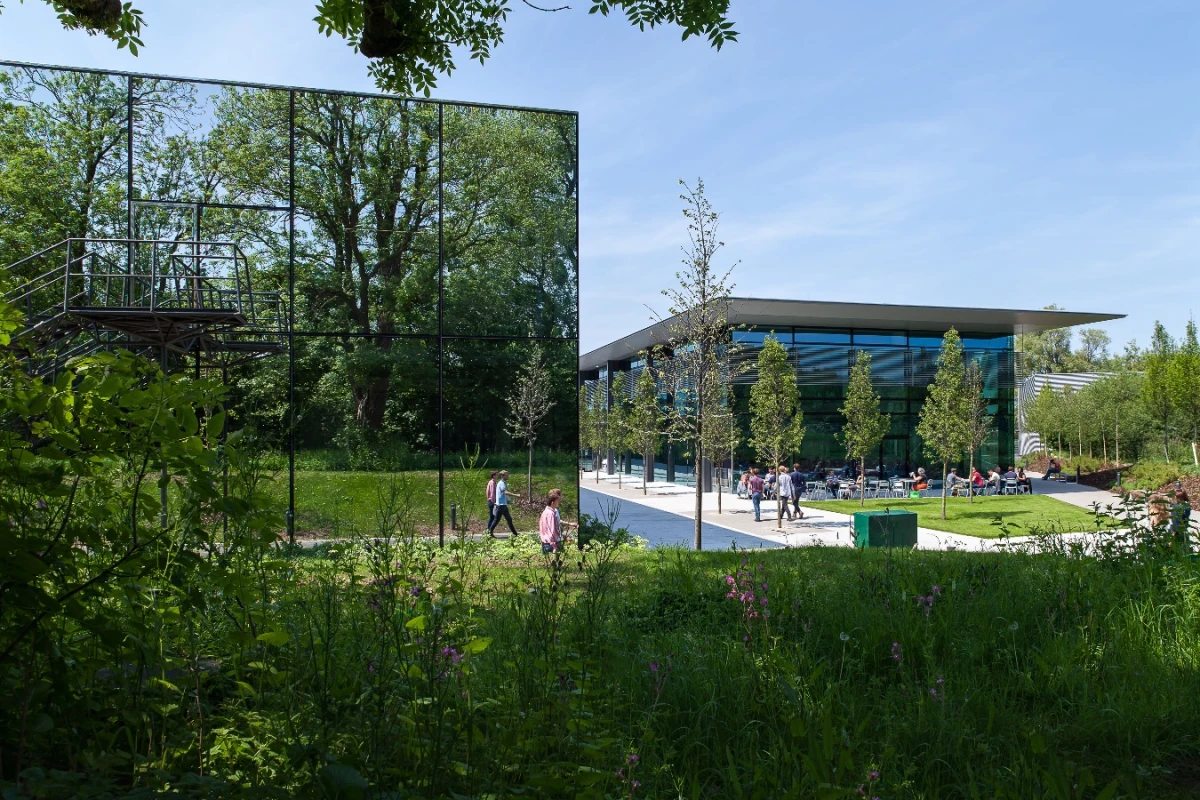The R&D building aims to hide Dyson's upcoming inventions from prying eyes with a facade of highly-reflective glazed panels