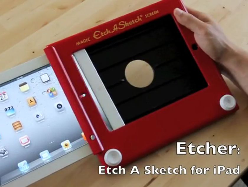 Inserting the iPad into the Etcher case