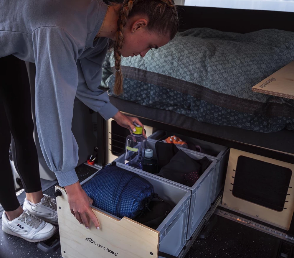 The center slide pulls inside the van and offers three more Euroboxes of storage