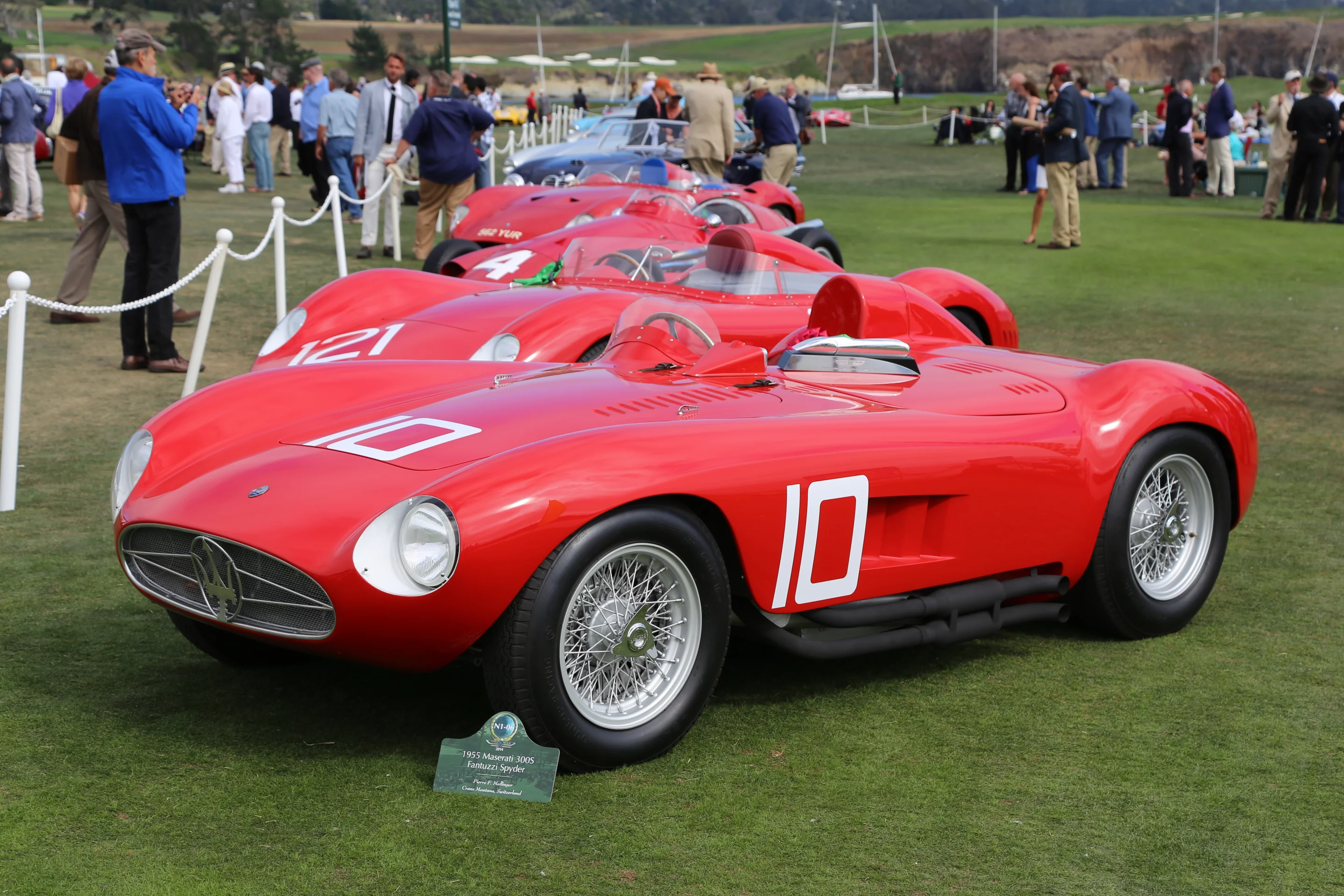 A 1955 Maserati 300S Fantuzzi Spyder sits at the front of a row of red Italians (Photo: Angus MacKenzie/Gizmag.com)