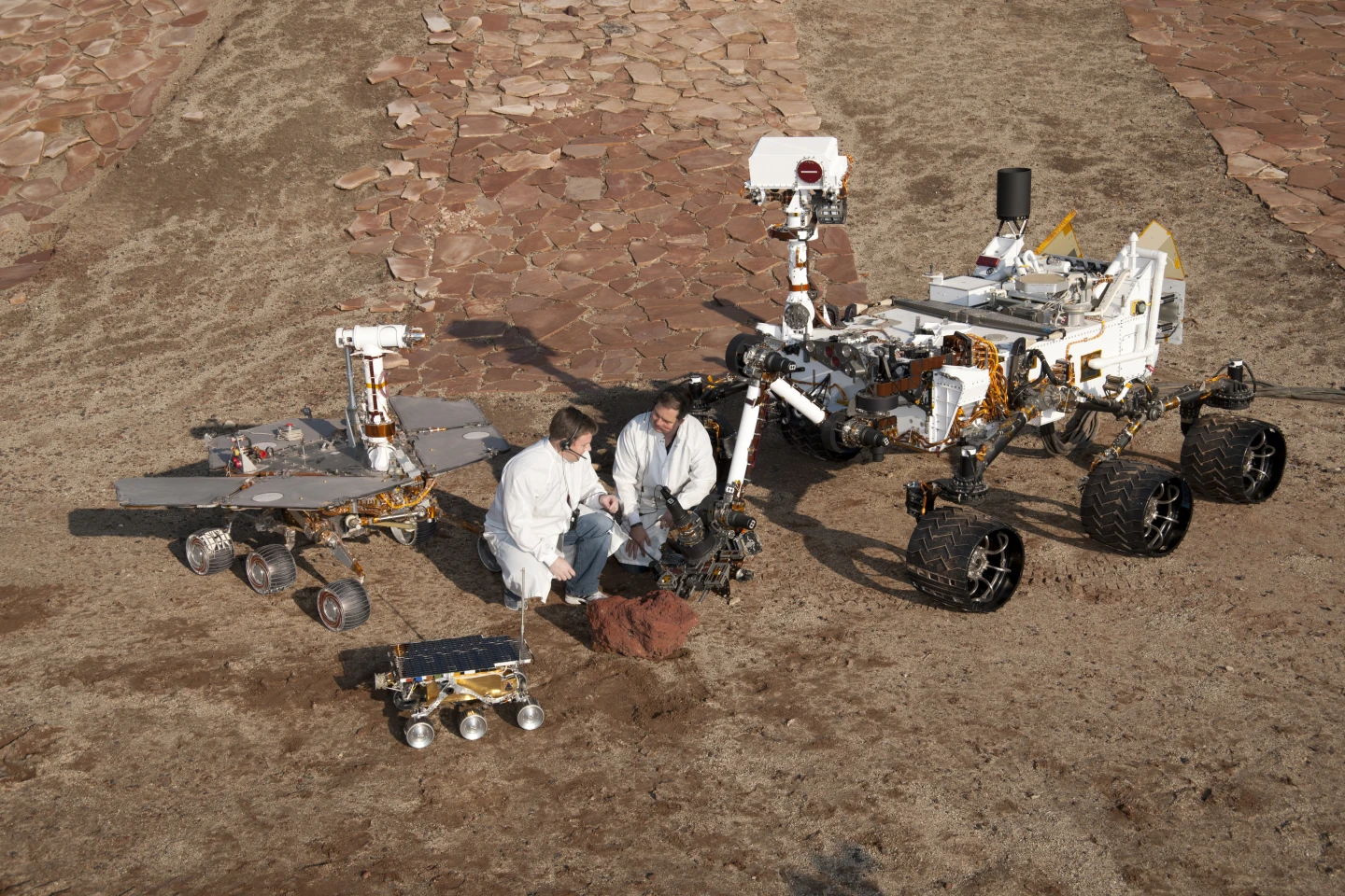 Clockwise from the bottom, Sojourner, Opportunity, and Curiosity
