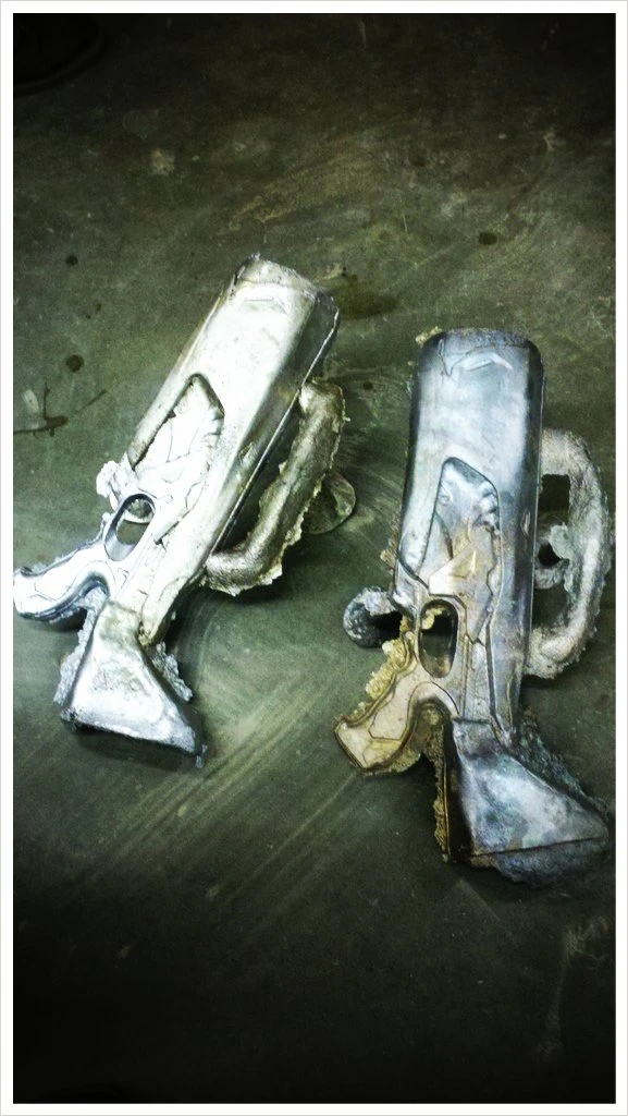 The sand-cast aluminum main body housing, based on a Nerf gun