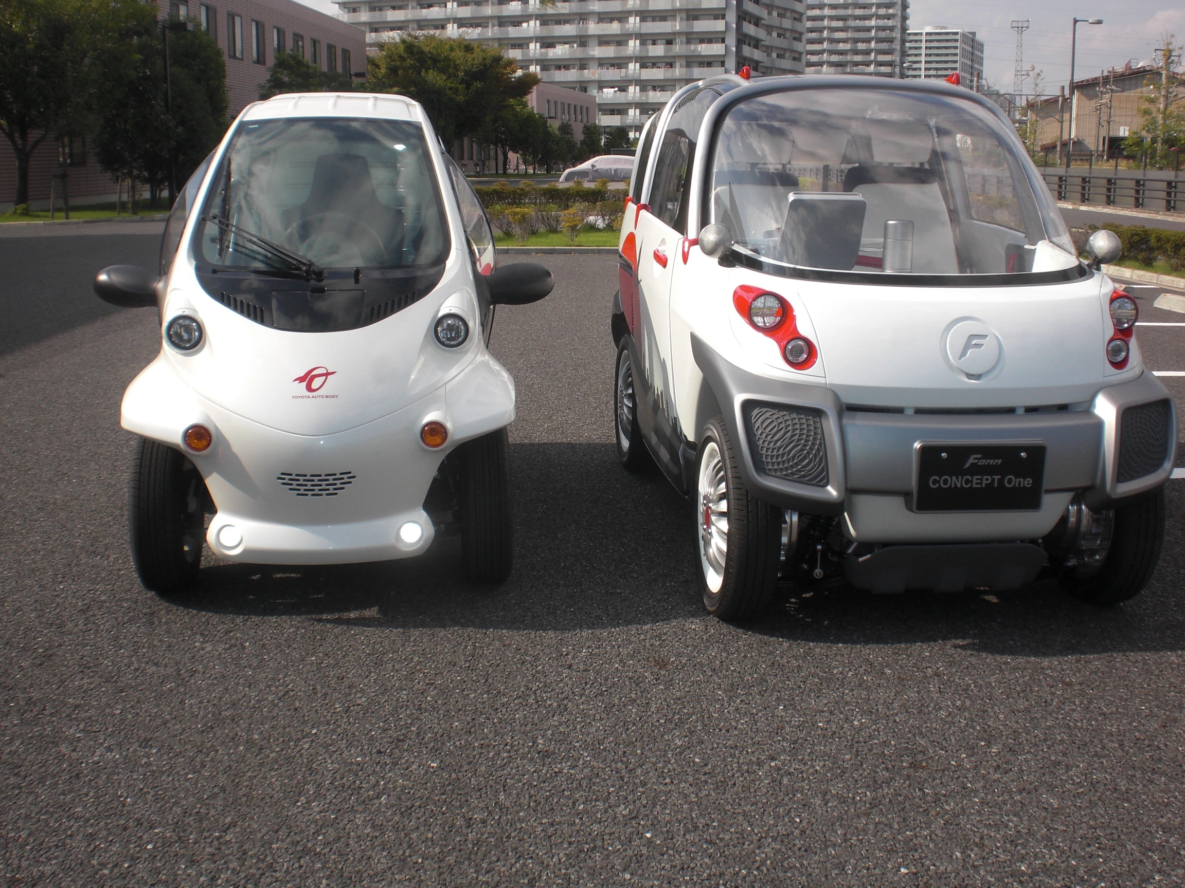 On the left is a Toyota Coms, a super compact single seat Electric vehicle that Hideo Tsurumaki worked on at Toyota. The four seat Concept One is not that much bigger. (Photo: Stephen Clemenger/Gizmag.com)