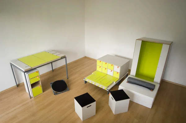Casulo contains an armoire cupboard, desk table and cabinet, height-adjustable revolving chair, two stools and a bed with mattress