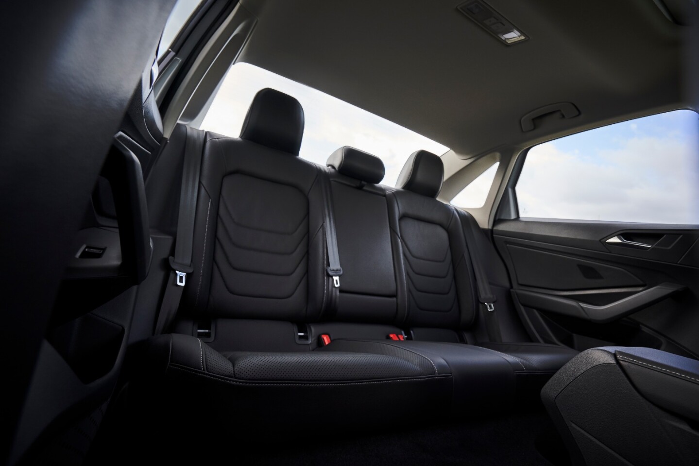 The rear seat can sit three across, but adults will find it tight (as they would in any compact)