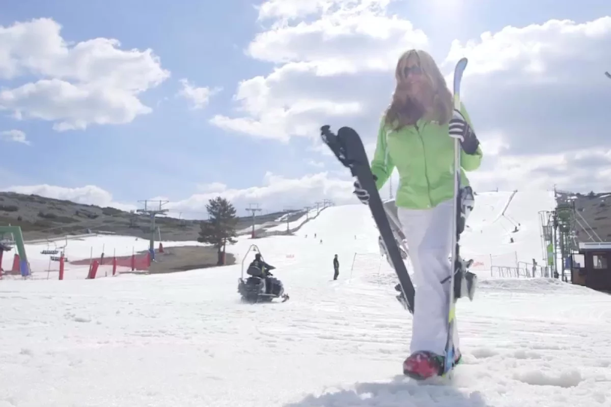 The SkiTaker system allows users to clip the bottoms of the skis onto the sides of their boots