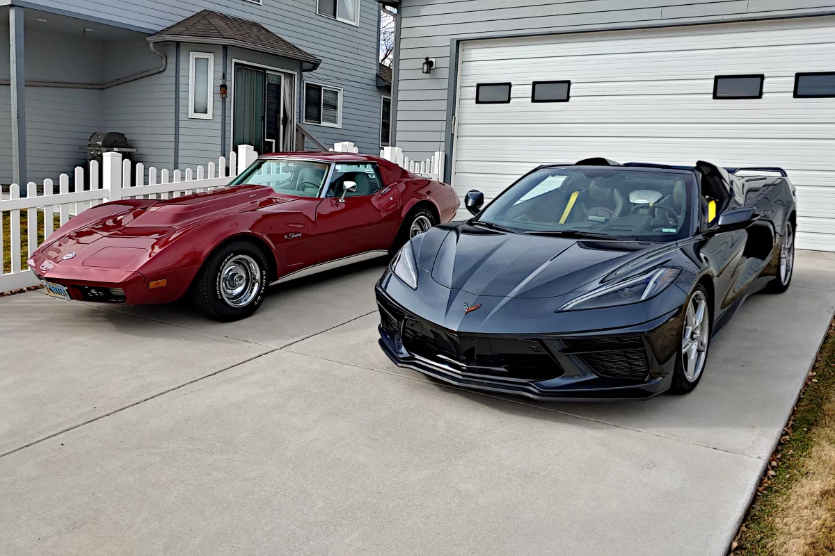The 2020 Corvette Stingray sits alongside a 1974 Corvette Stingray 454 model. Despite the age gap, they have a lot in common