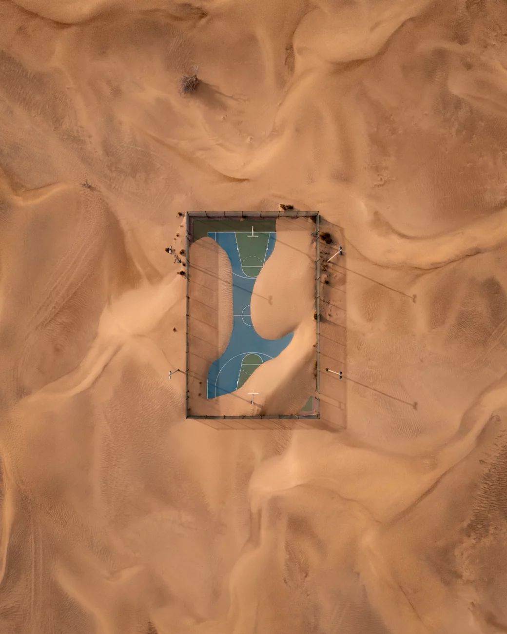 Drone Photo Awards. Runner Up - Urban. A basketball court after a sand storm in the United Arab Emirates