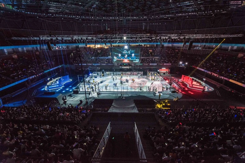 The RoboMaster arena is about the size of a basketball court and is filled with numerous obstacles for the robots to overcome on their way to victory or defeat
