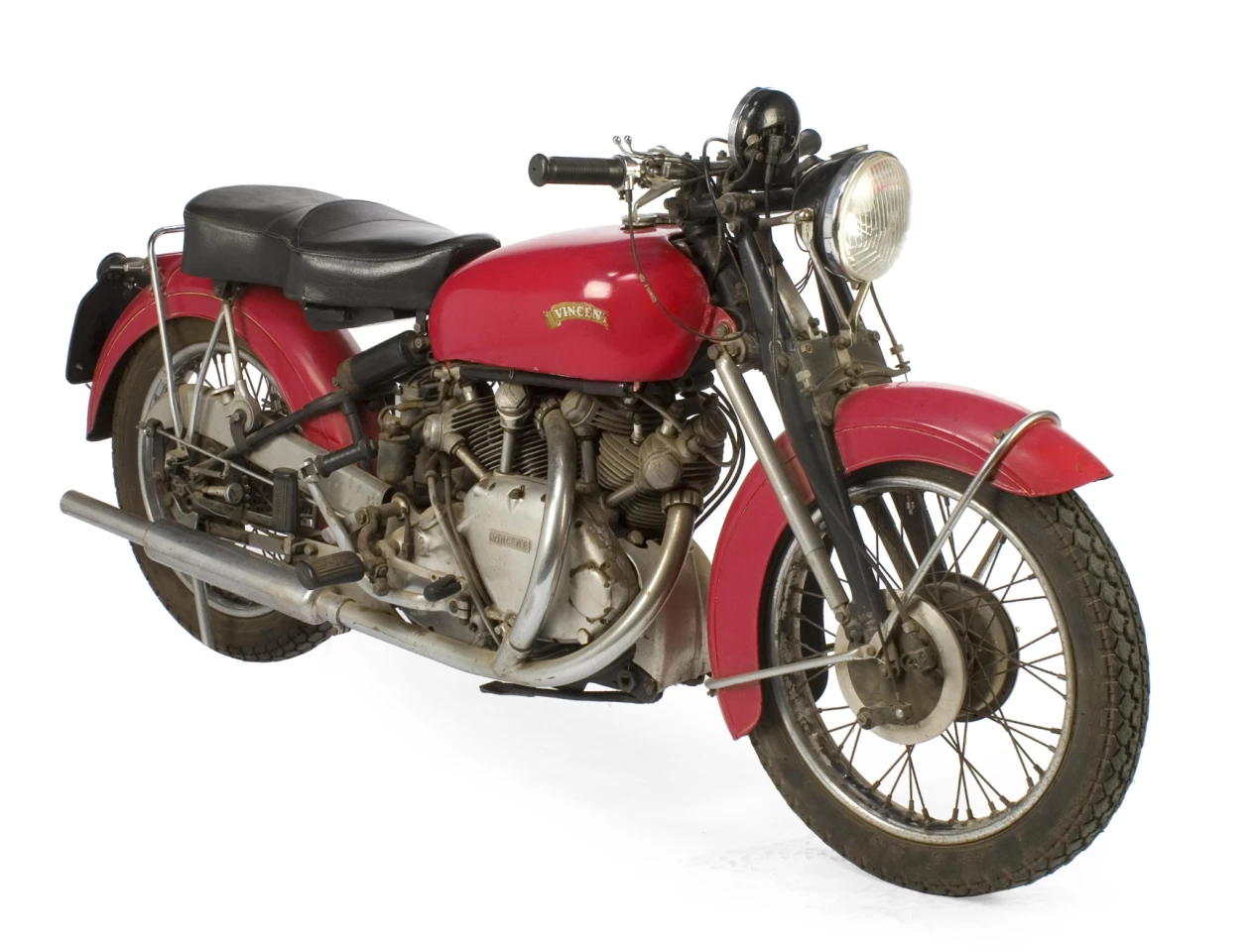 This remarkably preserved 1952 Vincent 998cc Series C Rapide is one of only 12 built in Chinese Red & Black, and sold originally by a dealer in Fresno, CA. The bike is believed to have completed less than 10,000 miles to date and, even more remarkably, has so far had but two owners. Its untouched condition coupled with the splendid patina is reflected in the ownership and mileage figure! It sold for $99,450 at Bonhams' January Las Vegas auction in 2011.