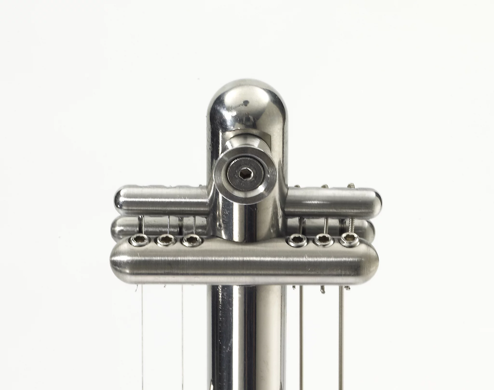 The new headstock's string lock mechanism is said to provide an isolated vice grip on each string individually to prevent pitch from wandering