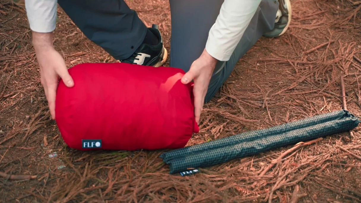 The main tent packs into a sack, while the carbon hammock poles pack into a separate sleeve
