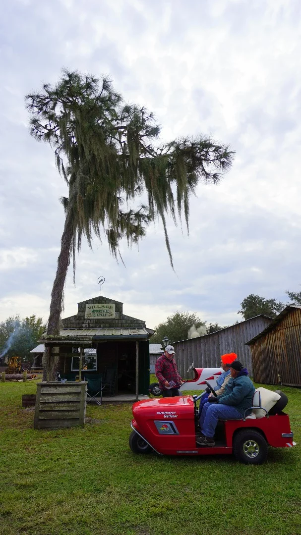 The Florida Flywheelers Club has made an entire village all from wood cut in the vintage saw mill. This is the Motorcycle Shop.
