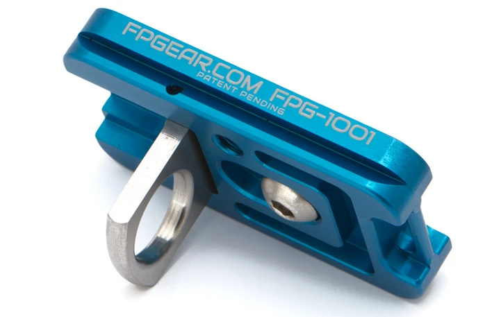 When not using a tripod, photographers simply flip-down the concealed loop on the Fusion Plate and attach their shoulder strap
