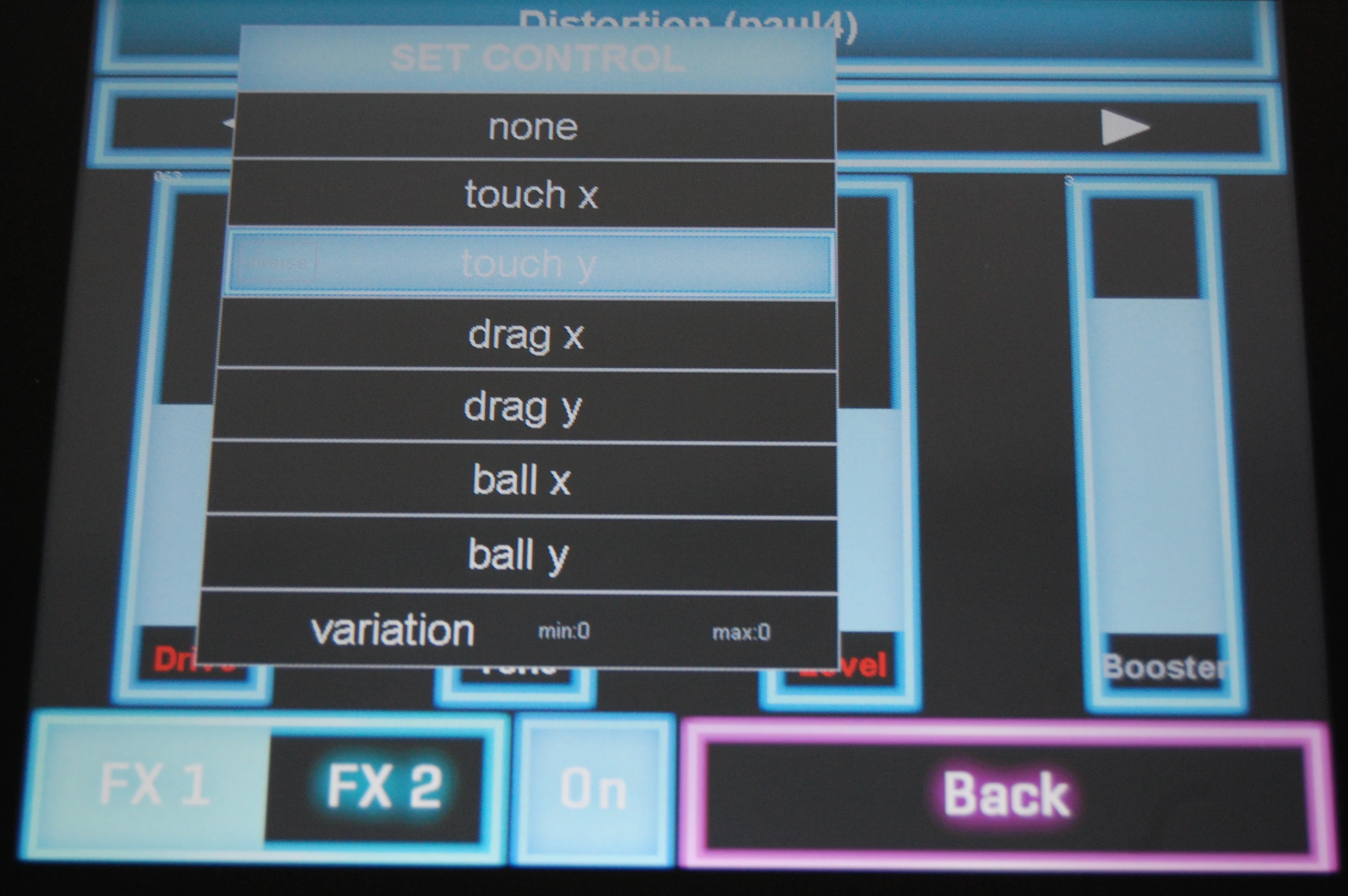 Here I assign an action to the touch panel so when I slide my finger over the Y axis, the drive increases in intensity