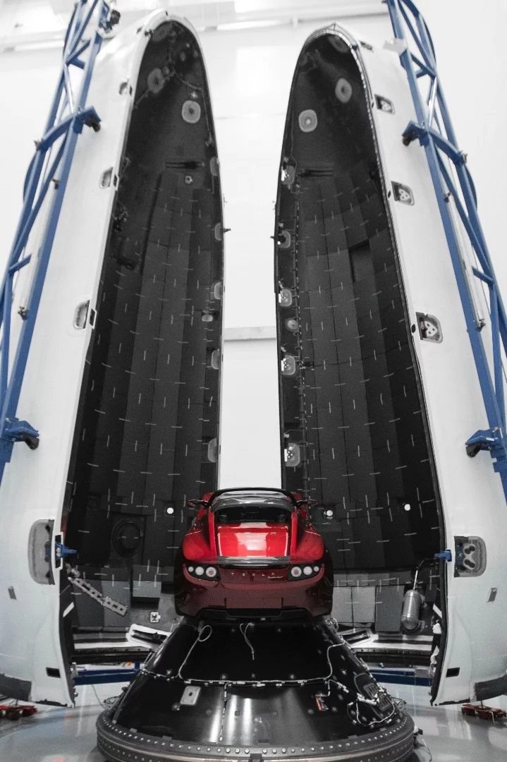 Photos shared on Flickr recently show Elon Musk's original Tesla Roadster being loaded into the Falcon Heavy rocket ahead of a January launch