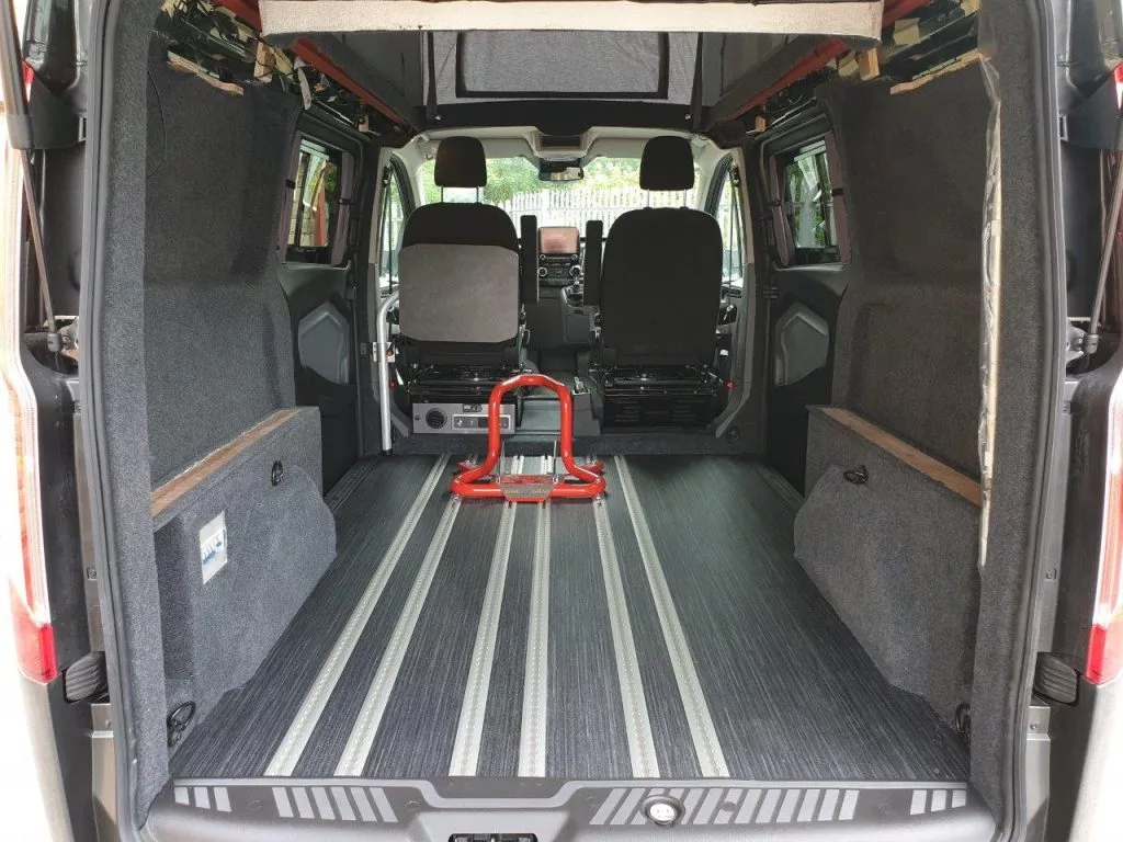 The two sets of floor rails (third is optional) allow for mounting seats, camping furniture and motorcycle chocks