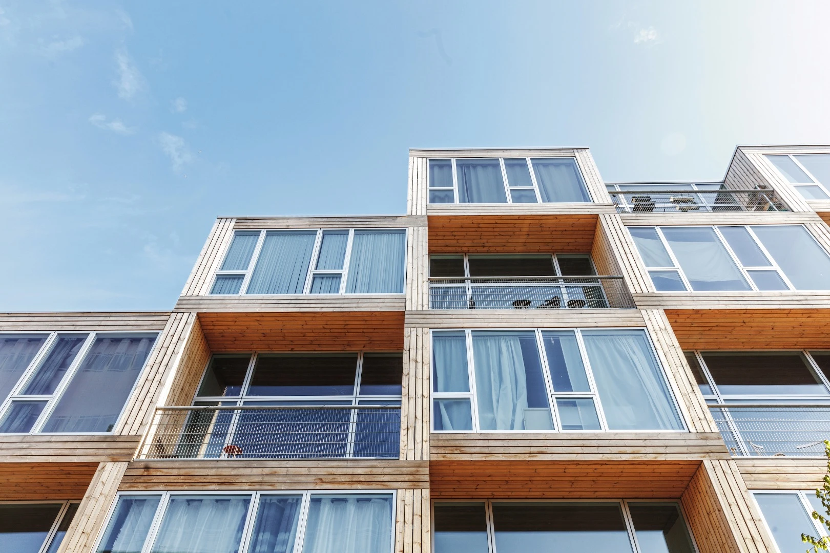 Dortheavej Residence's concrete exterior is clad in wood, which softens its appearance